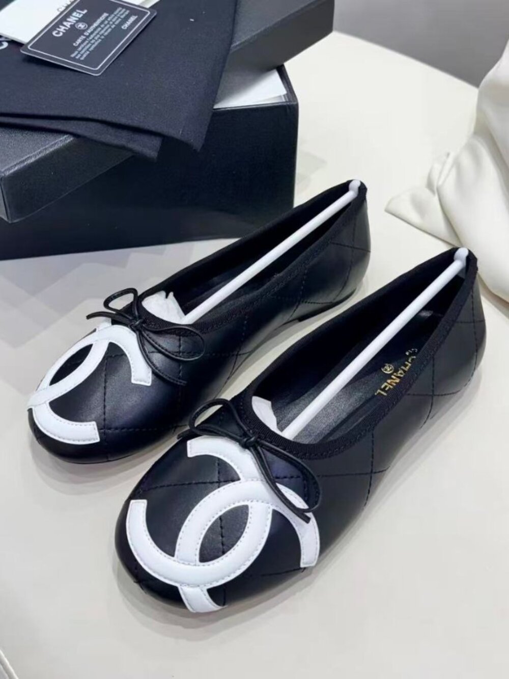 Chanel Black Quilted White CC Logo Bow Ballet Flats Size 37